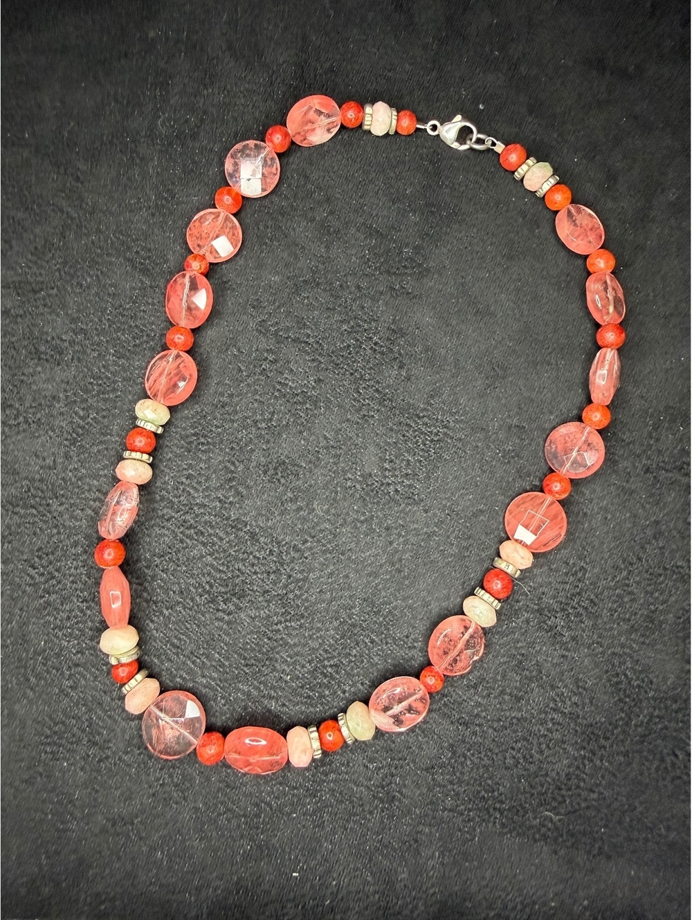 Coral colored beaded necklace
